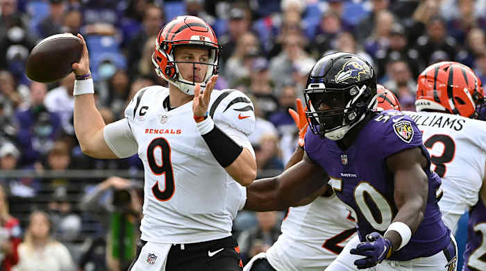 Joe Burrow throwing a pass against the Ravens.